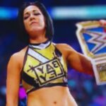 Bayley's Reign Continues: A Night of Drama and Victory in Cardiff!