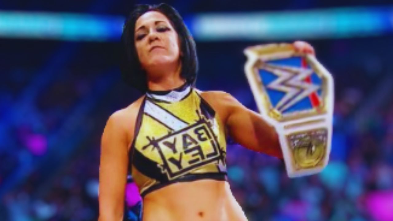 Bayley's Reign Continues: A Night of Drama and Victory in Cardiff!